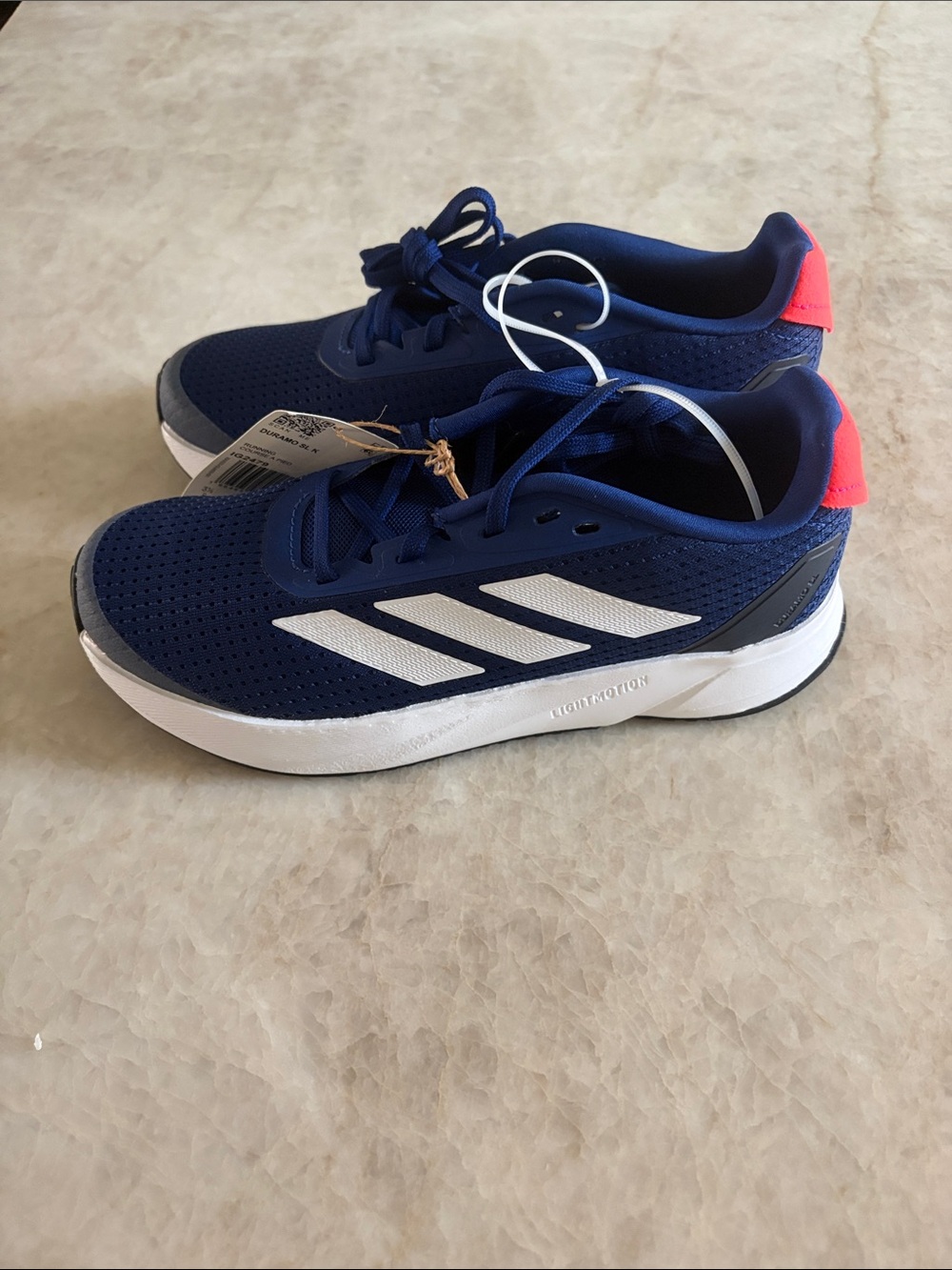 adidas big Boys 4 Navy Blue Sneakers with White Stripes and orange Heel